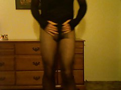 cross dresser stripping down to pantyhose