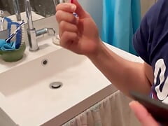 Take double cumshot in bathroom