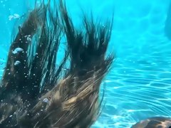 Ebony MILF model Ana Foxxx dips in pool
