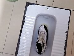 piss in air jordan sneakers
