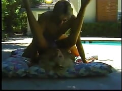 Blonde slut gets pounded outdoors by the pool