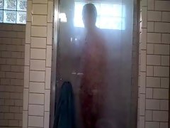 Old *** sitter viigorously rubbing clit and asshole in shower